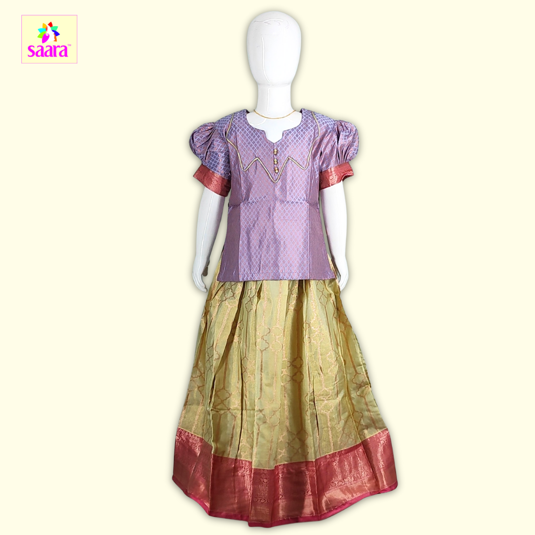 This Pattupavadai with lavender top with patternwork and paired with pista green skirt.