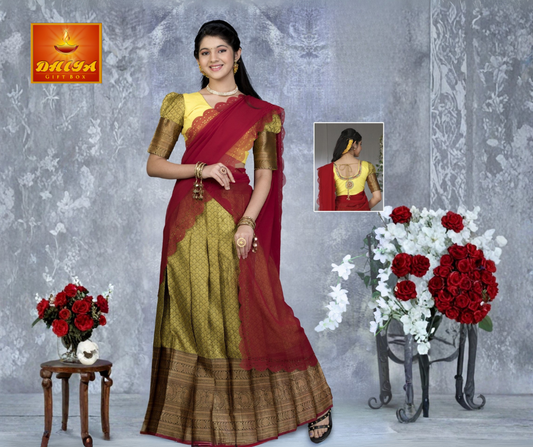 Red and yellow half saree with hole detailings at hem of the shawl ,printed skirt, zari border, puff sleeves, and back design in Blouse.