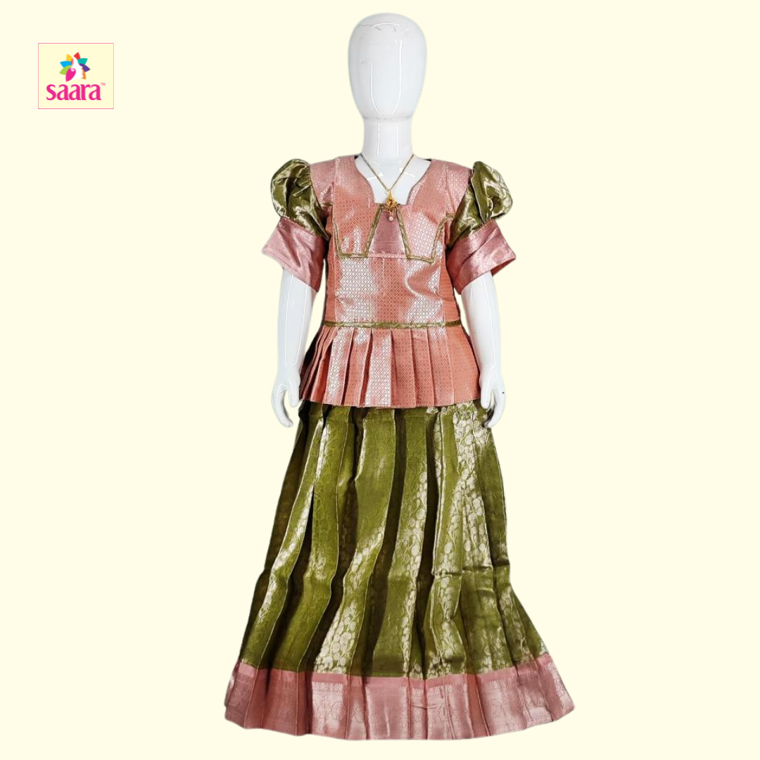 This is a Peach and Green Colour Pattern work pattupavadai.