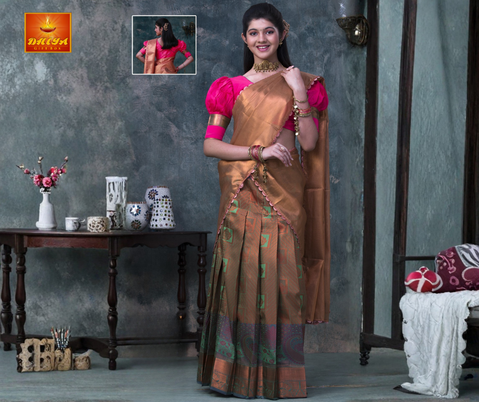 Pink Blouse with puff sleeve and gold half saree with printed skirt, zari border.