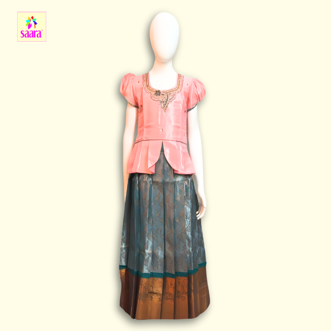 Pink & Blue pattu pavadai with Aari Work  blouse, pleated waist, and printed skirt with Golden border.
