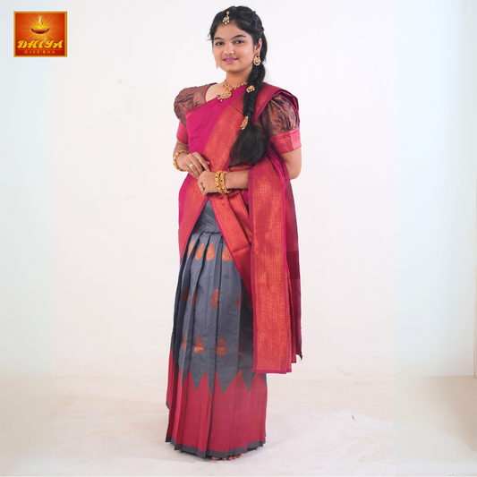 This Half saree features Pink shawl with and Grey printed Skirt ,Zari border, and matching Brown Puff sleeve blouse.