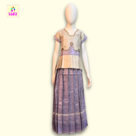 This Pattu Pavadai with stonework  worked top with frill design in Off white and Purple colour printed skirt 